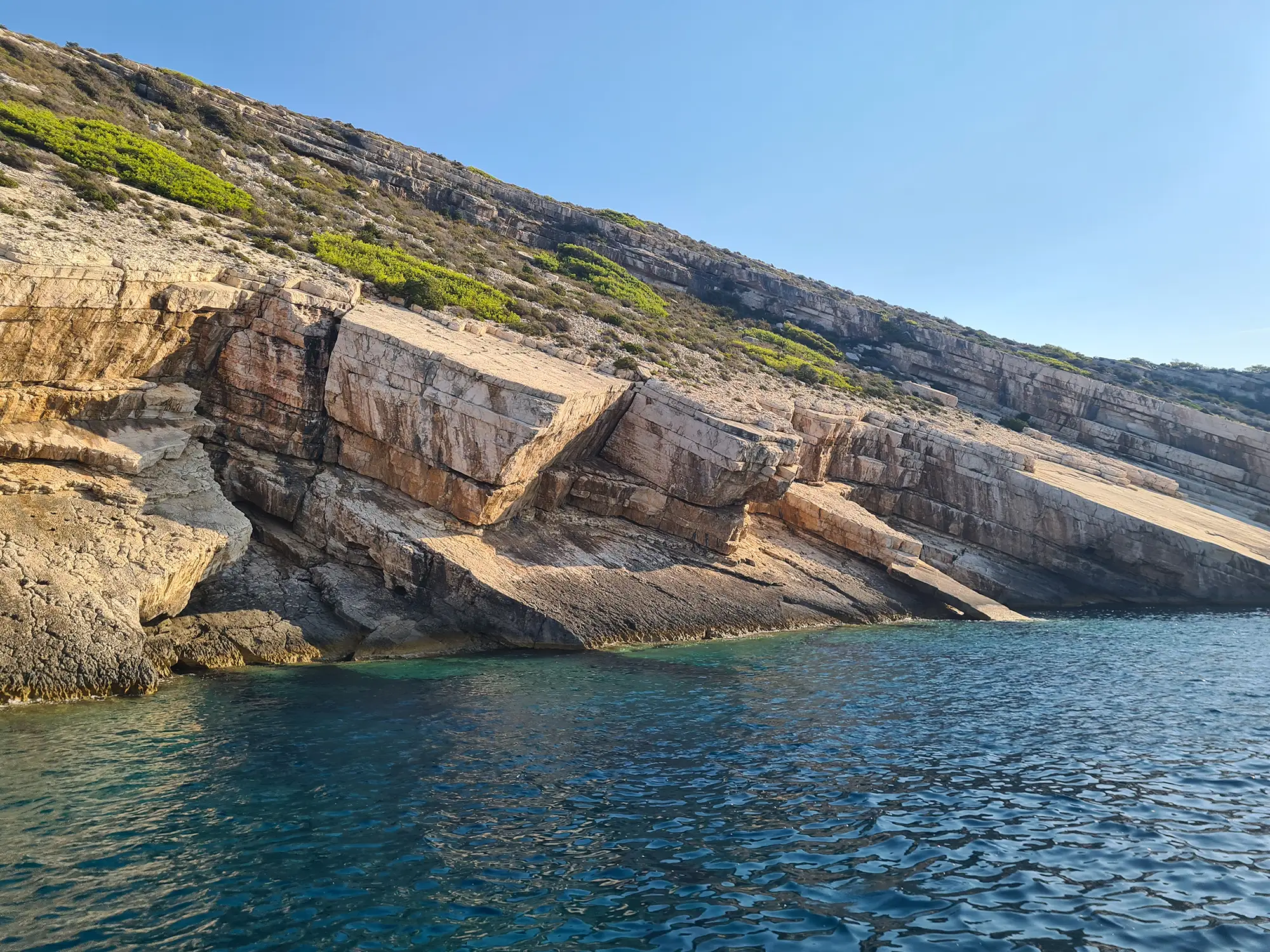 Island cliff, perfect secluded jumping spot, hidden coastal areas