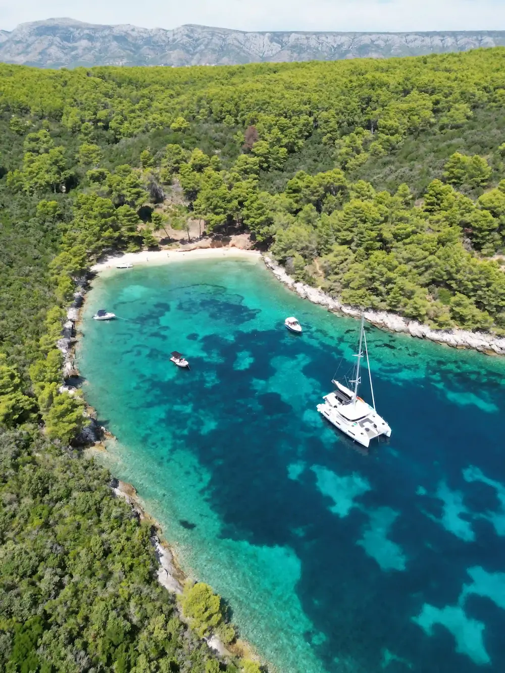 Catamaran inside a secluded cove