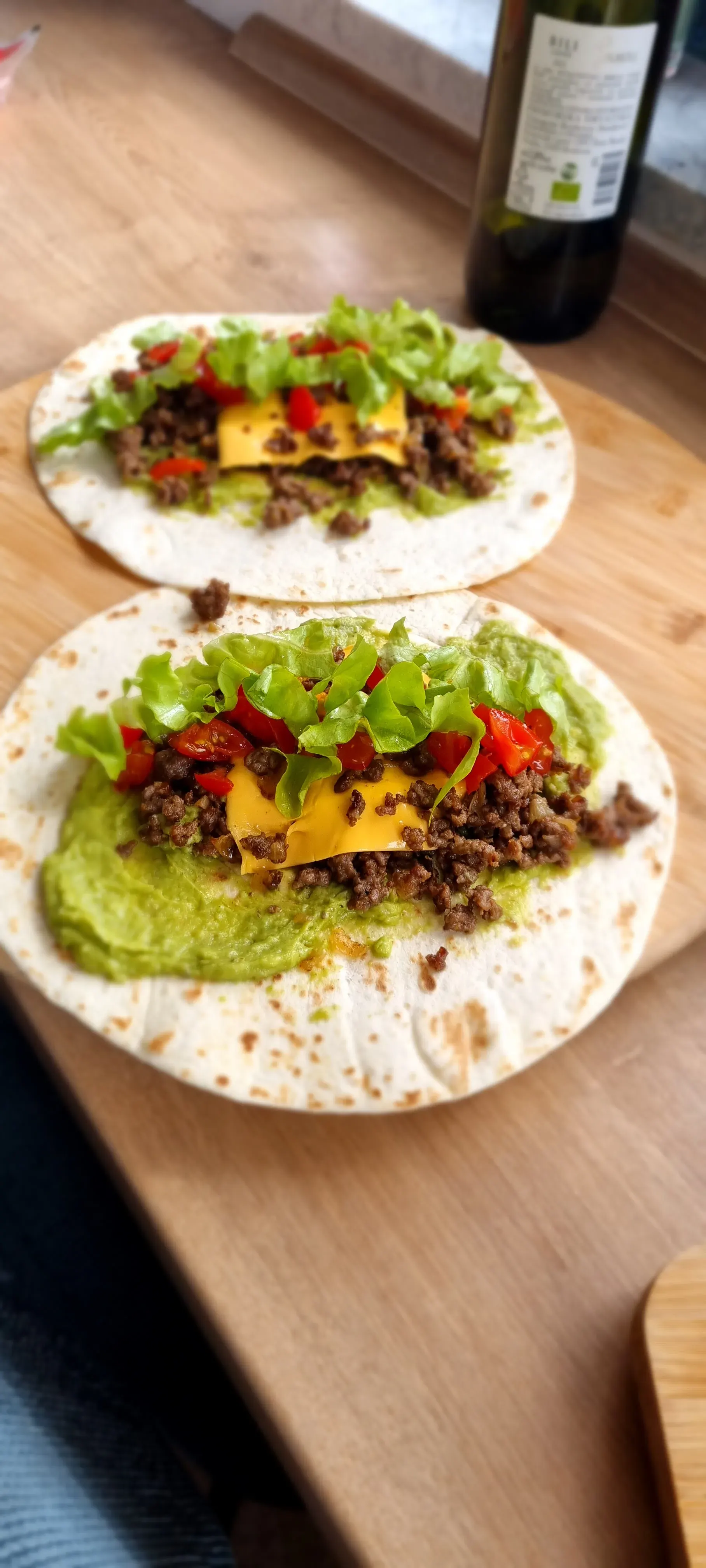 Tortillas with avocado cream, cherry and salad