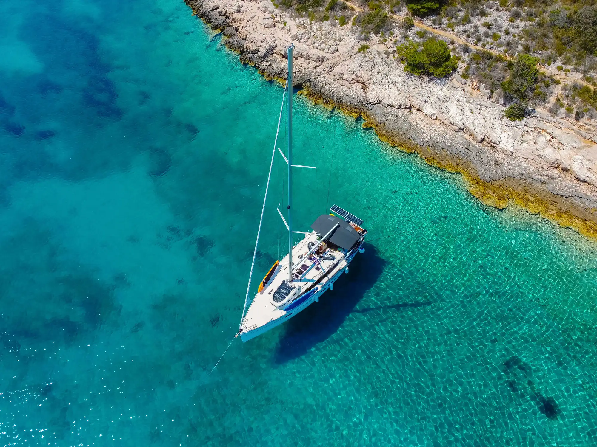 Yacht on cristal clear sea, stony bay, nature